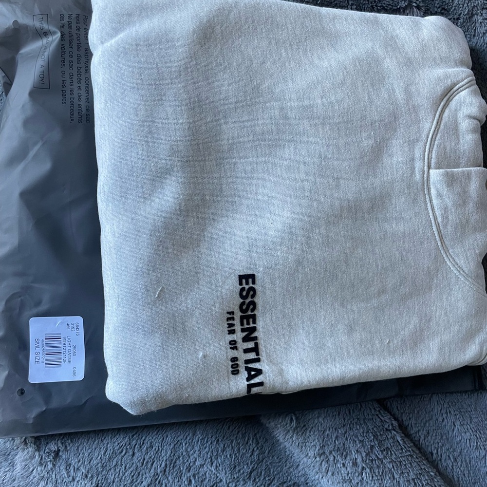 Fear of God Essentials Light Gray hoodie
